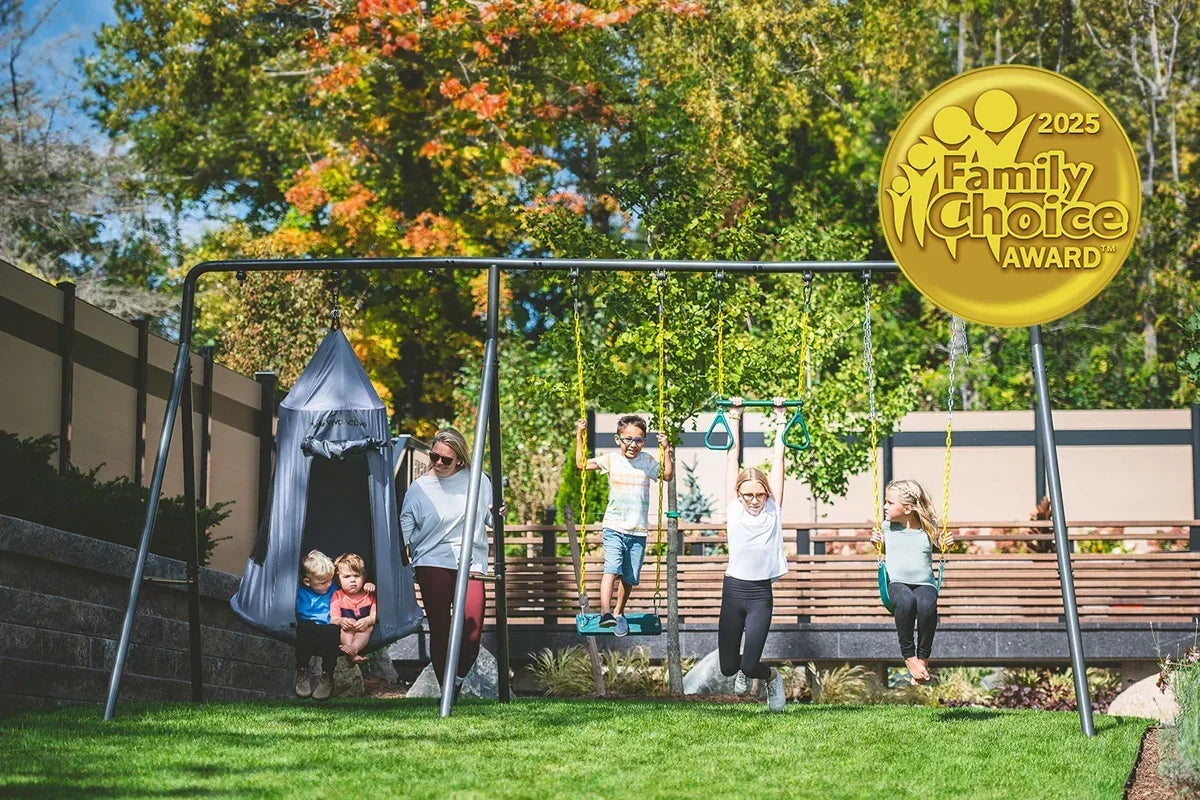 Five kids on a large metal swing with a woman supervising from behind. Family Choice Award badge is transposed on the image.